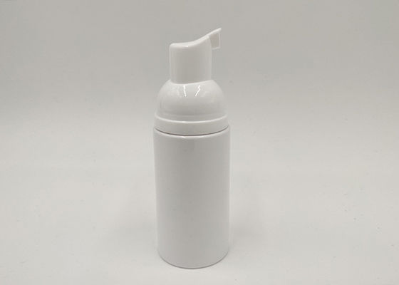 O cosmético plástico branco engarrafa a garrafa líquida da espuma